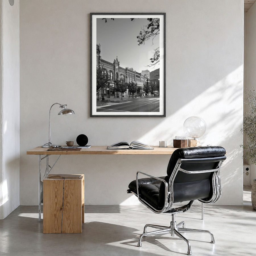 Park City Photo Poster in a black wood frame, hanging in a bright home office, white border