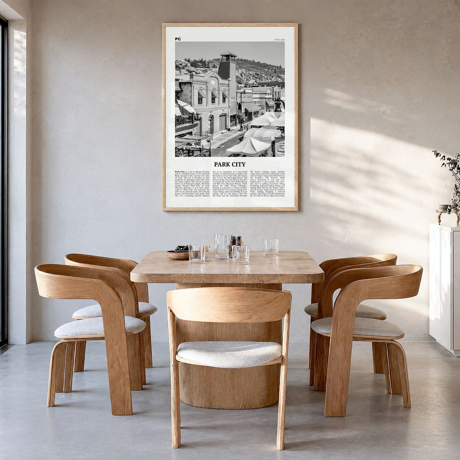Park City Newspaper Poster in a natural wood frame, hanging in a dining room