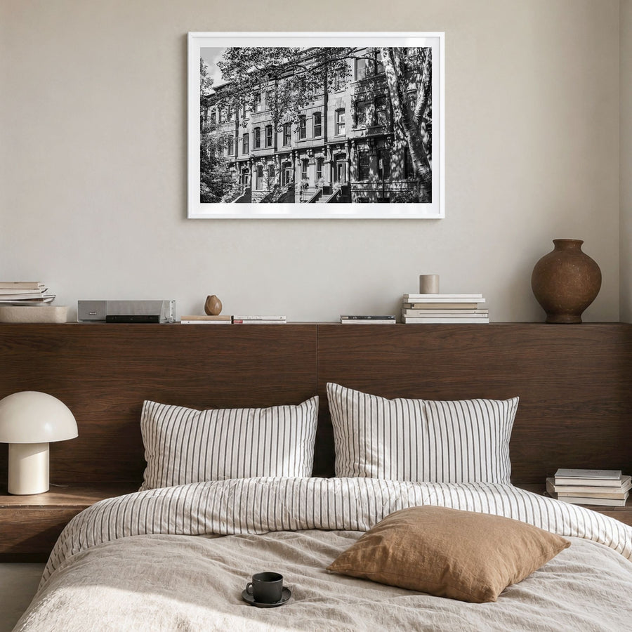 Park Slope Photo Poster in a white wood frame, hanging in a bedroom, white border