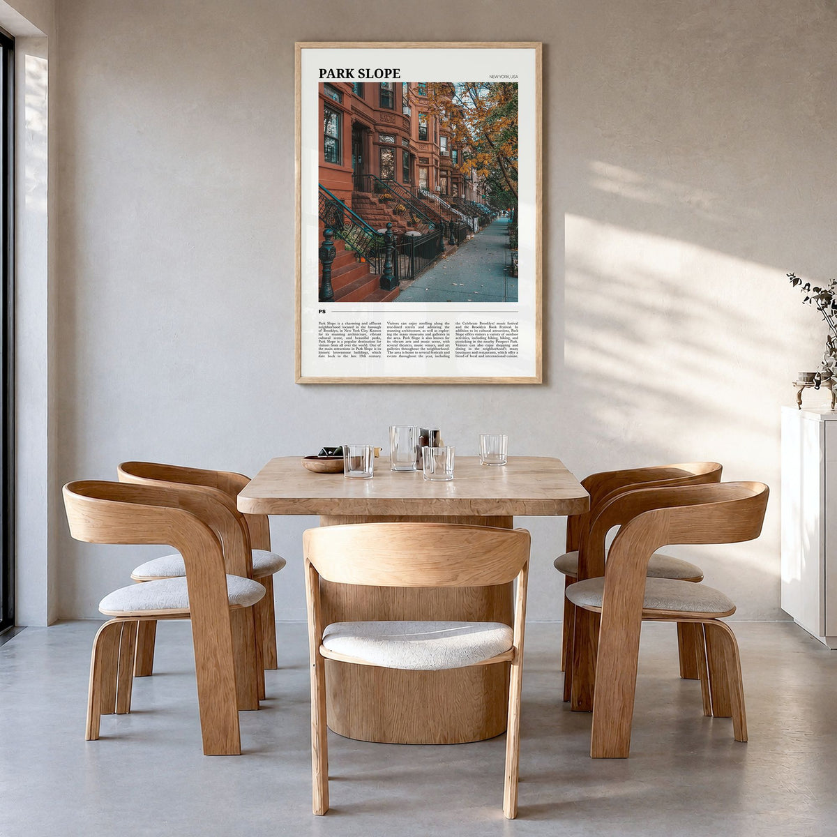 Park Slope Travel Poster in a natural wood frame, hanging in a dining room