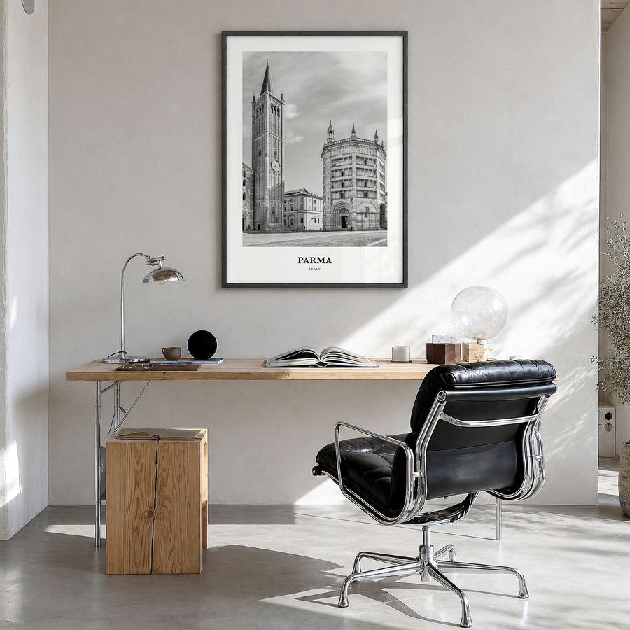 Parma Classic Poster in a black wood frame, hanging in a bright home office
