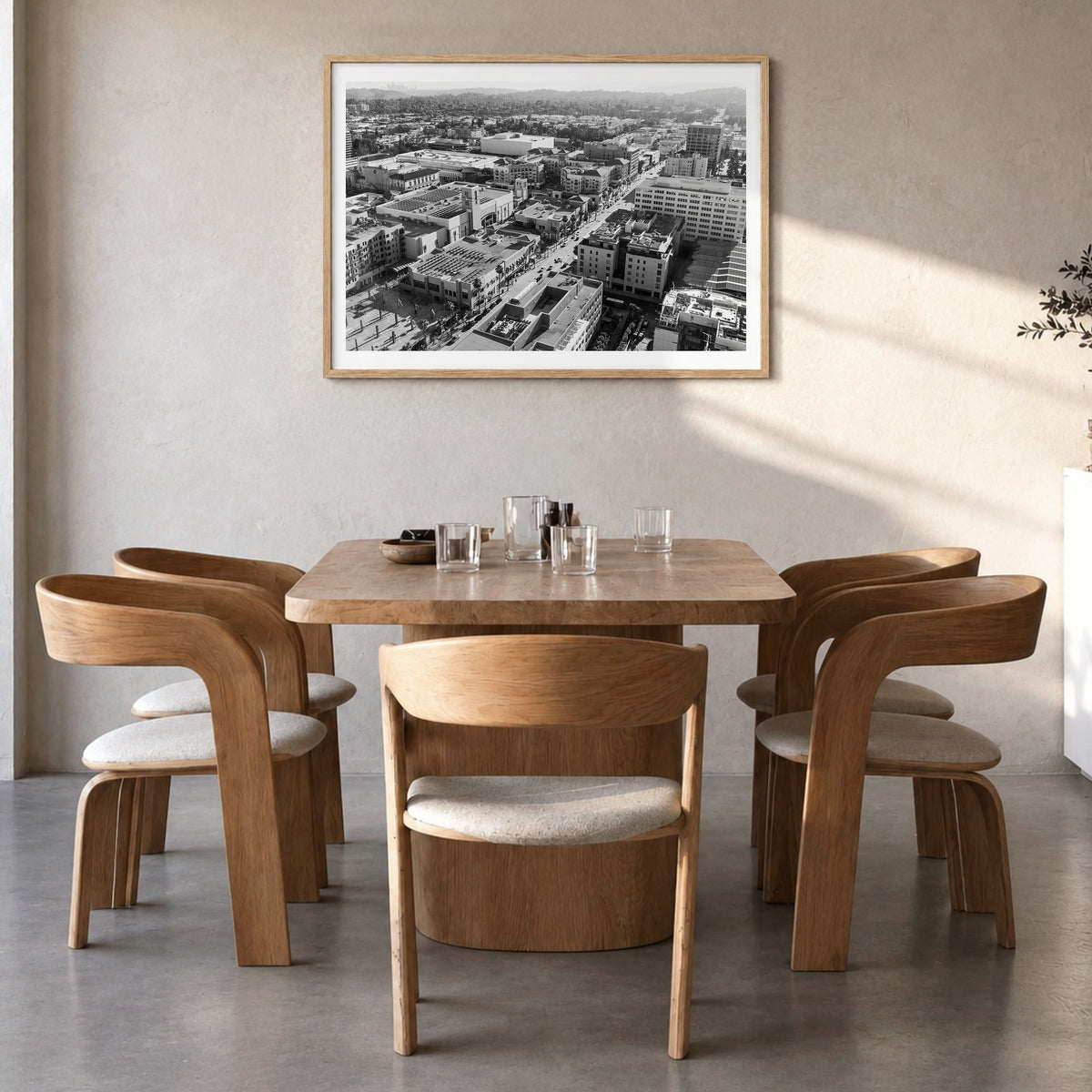 Pasadena Photo Poster in a natural wood frame, hanging in a dining room, white border