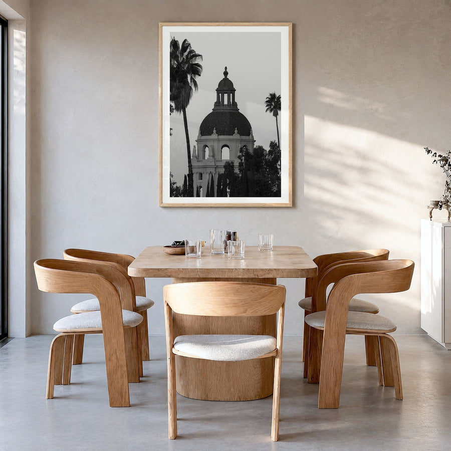 Pasadena Photo Poster in a natural wood frame, hanging in a dining room, white border