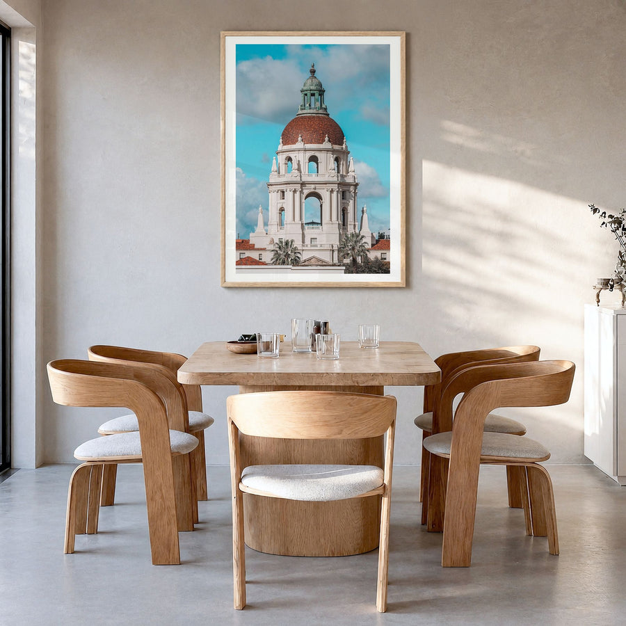 Pasadena Photo No 1 Poster in a natural wood frame, hanging in a dining room, white border