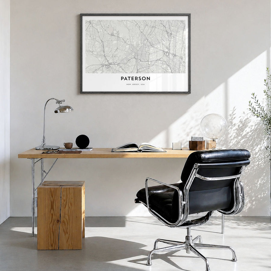 Paterson Map Poster in a black wood frame, hanging in a bright home office