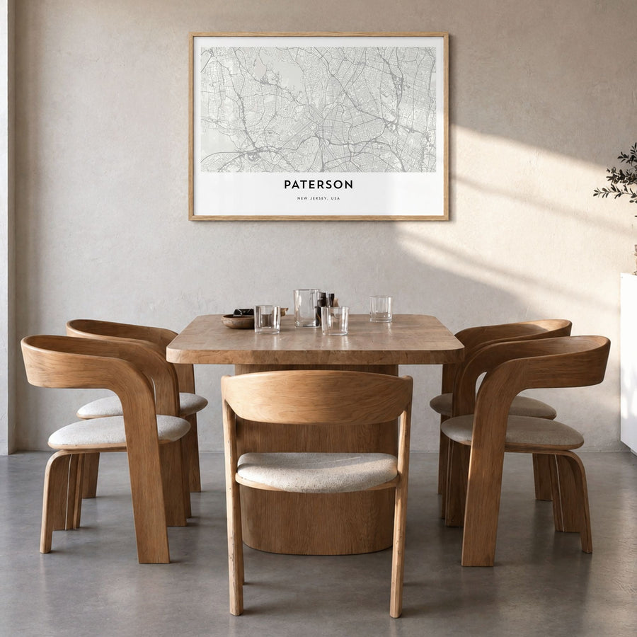 Paterson Map Poster in a natural wood frame, hanging in a dining room
