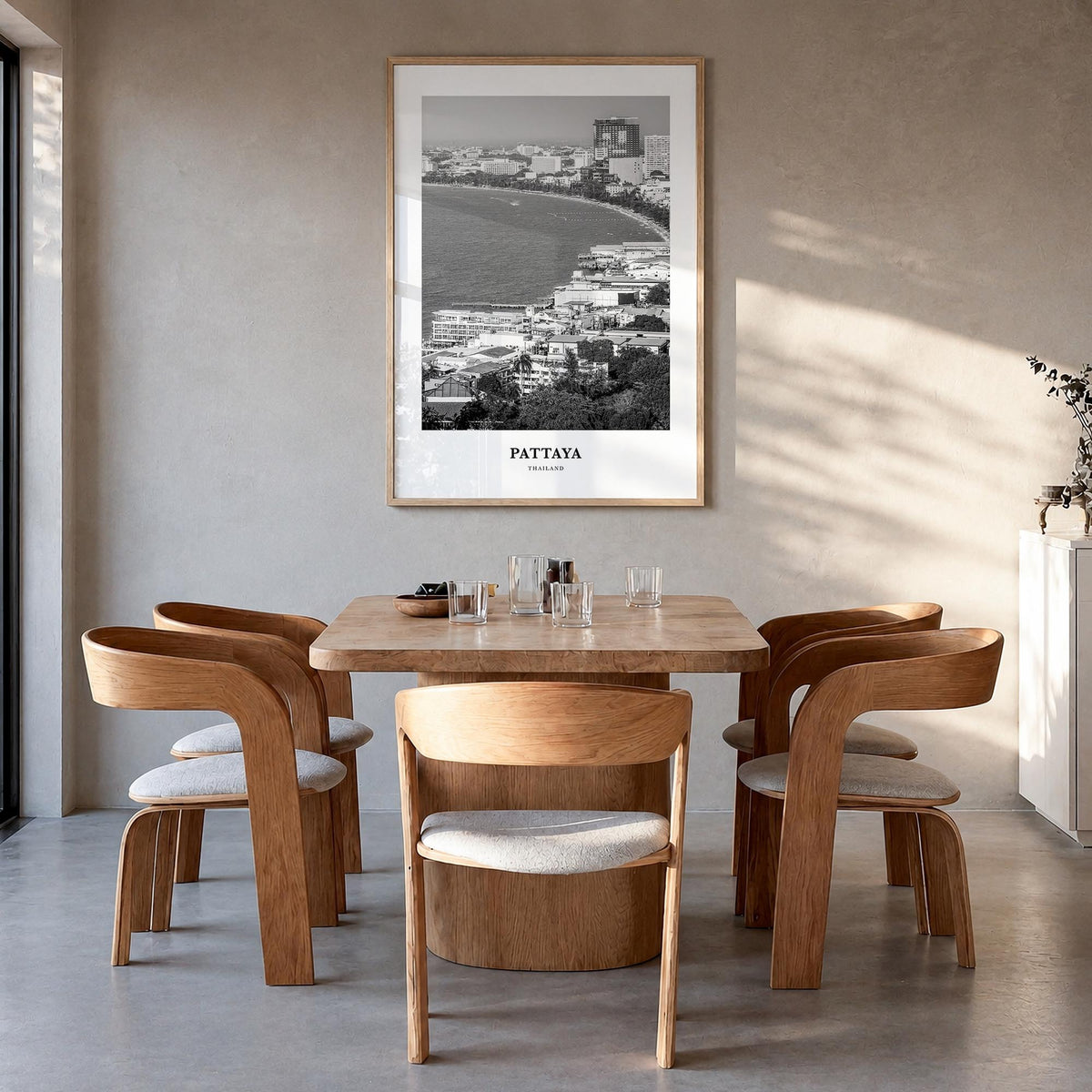 Pattaya black & white classic poster of Thailand – vertical wall art in natural wood frame, hanging on wall