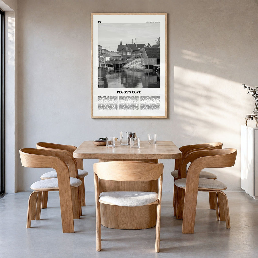Peggy's Cove Newspaper Poster in a natural wood frame, hanging in a dining room