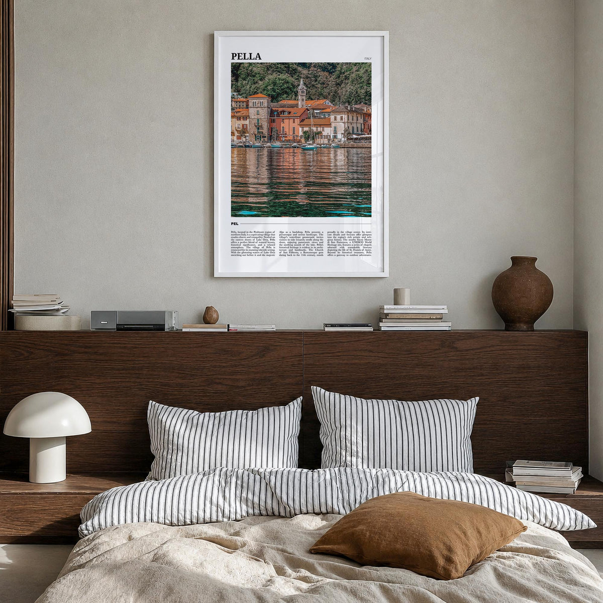 Pella, Italy no. 1 colorful travel poster of Italy – vertical wall art in white wood frame, hanging on wall