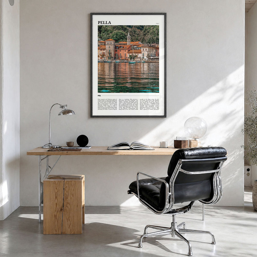 Pella, Italy Travel No 1 Poster in a black wood frame, hanging in a bright home office
