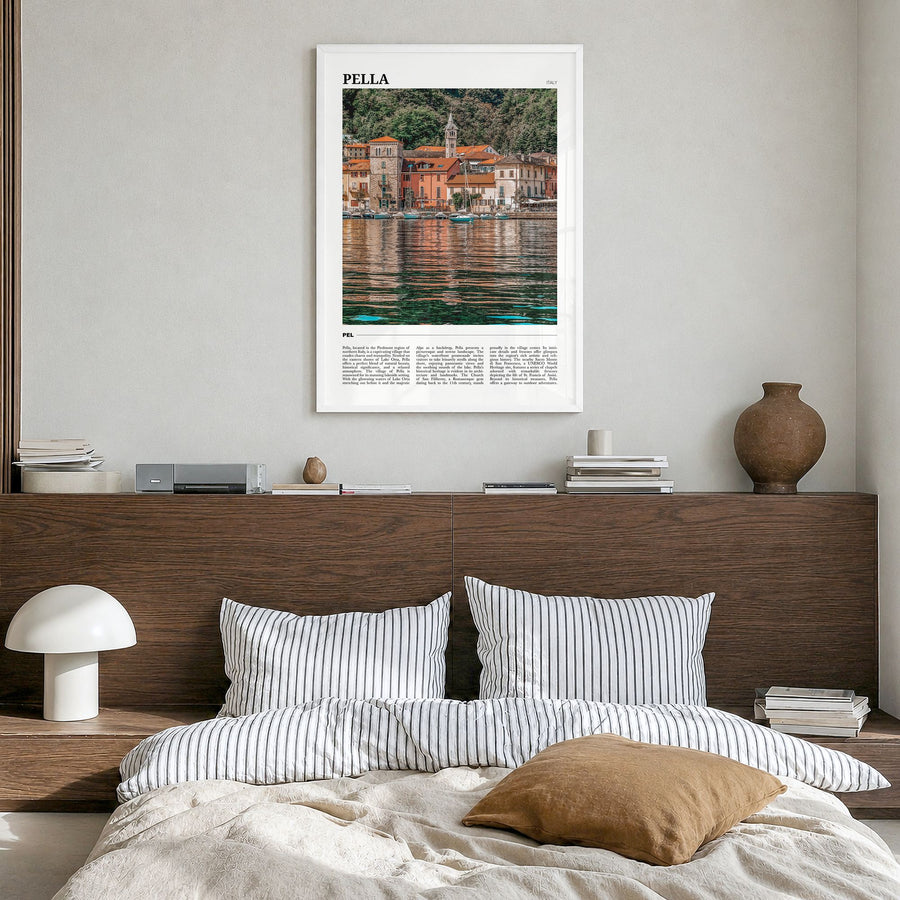 Pella, Italy Travel No 1 Poster in a white wood frame, hanging in a bedroom