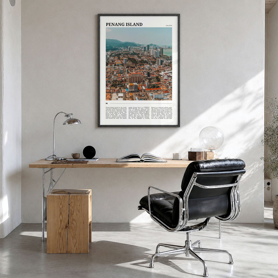 Penang Island Travel Poster in a black wood frame, hanging in a bright home office