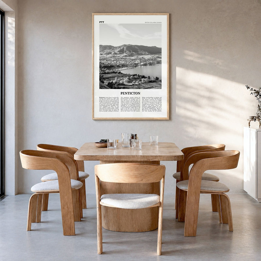Penticton Newspaper Poster in a natural wood frame, hanging in a dining room