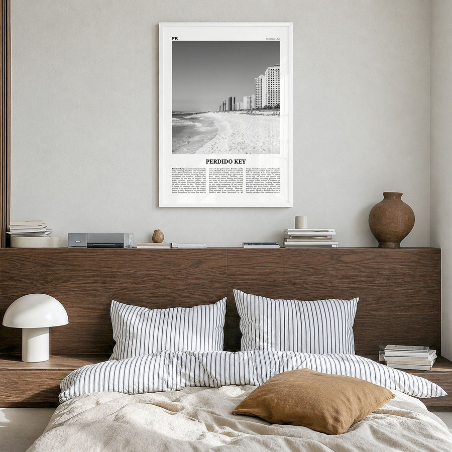 Perdido Key Newspaper Poster in a white wood frame, hanging in a bedroom