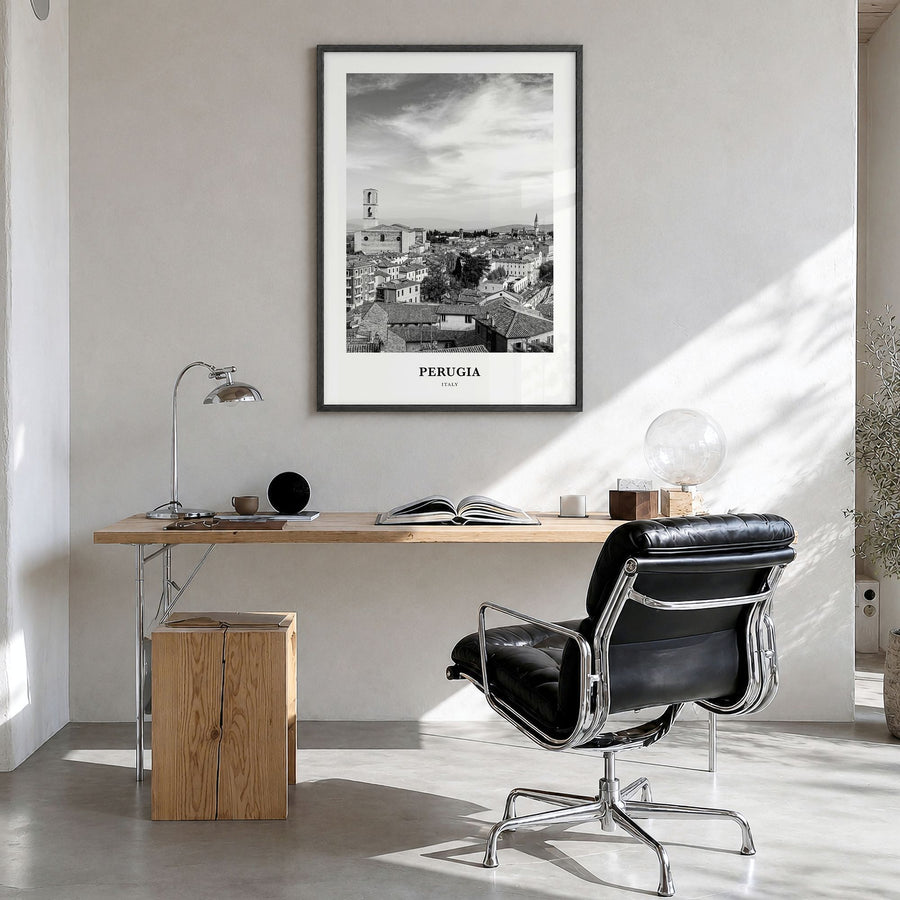 Perugia Classic Poster in a black wood frame, hanging in a bright home office