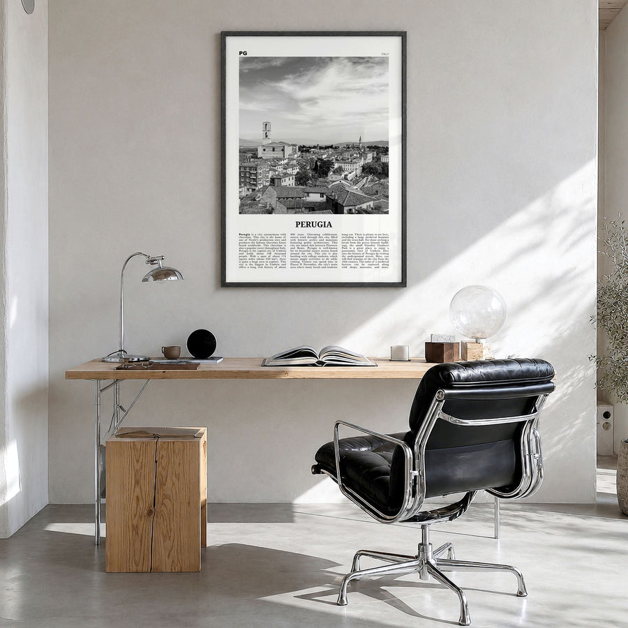 Perugia Newspaper Poster in a black wood frame, hanging in a bright home office