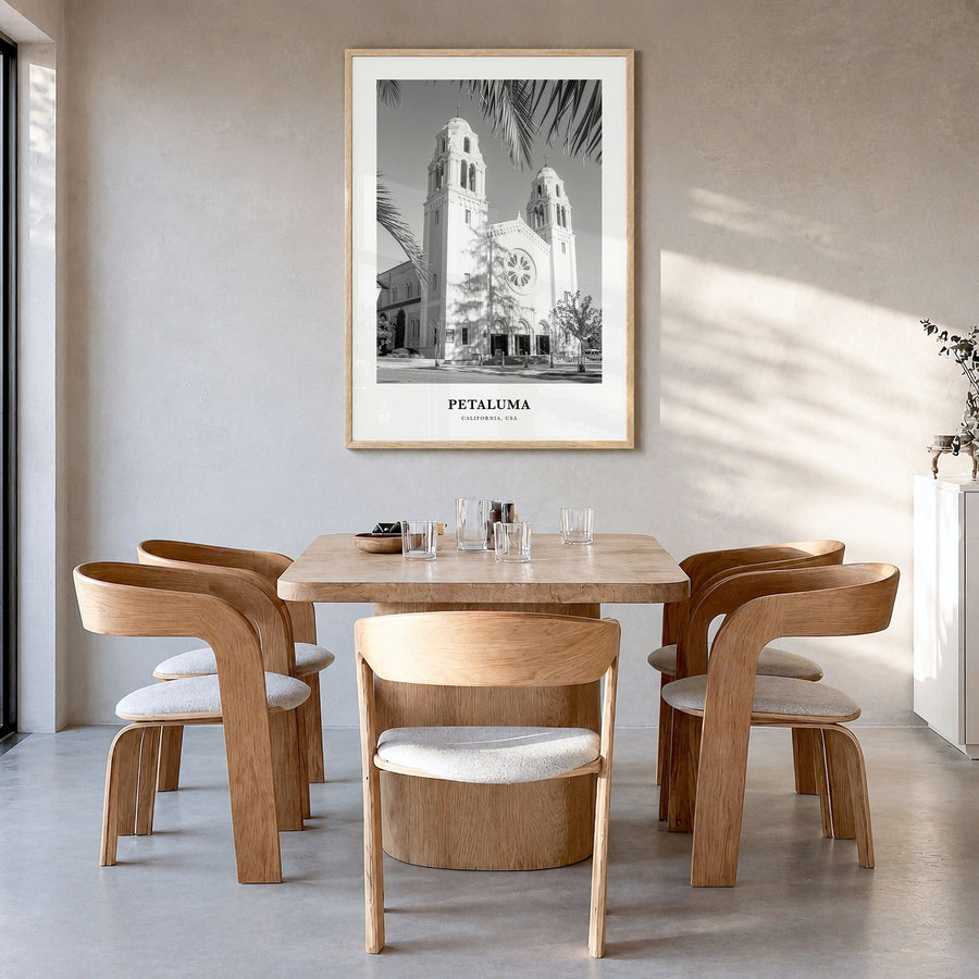 Petaluma Classic Poster in a natural wood frame, hanging in a dining room