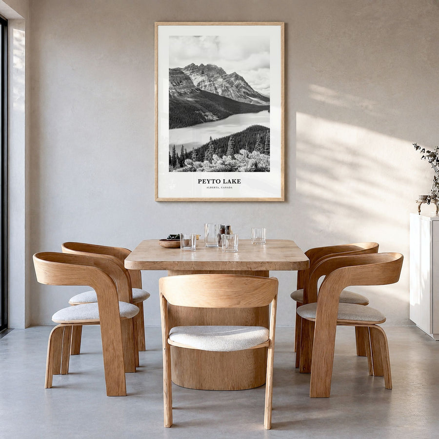 Peyto Lake Classic Poster in a natural wood frame, hanging in a dining room
