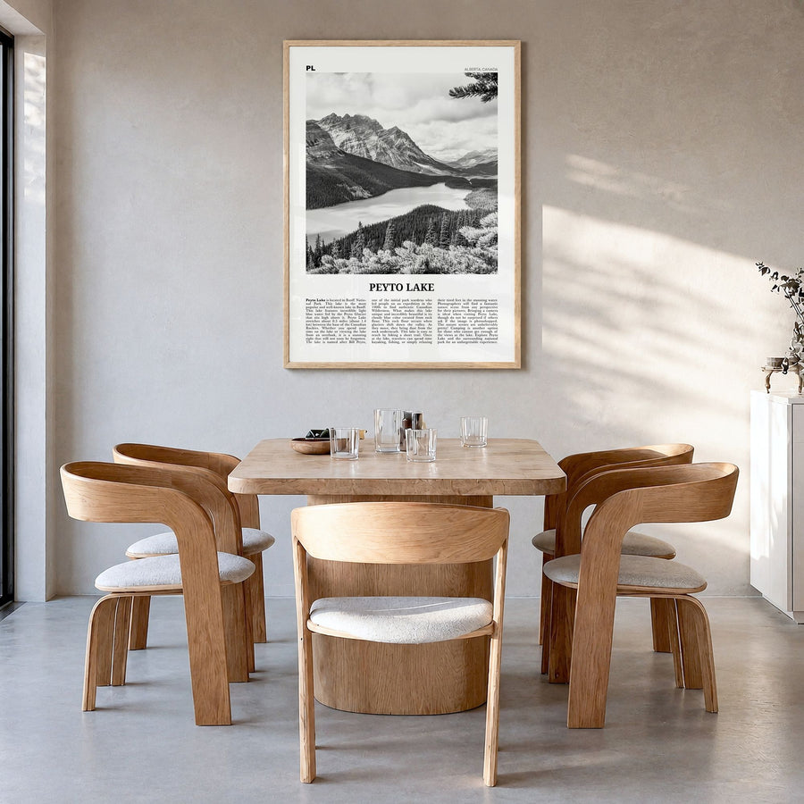 Peyto Lake Newspaper Poster in a natural wood frame, hanging in a dining room