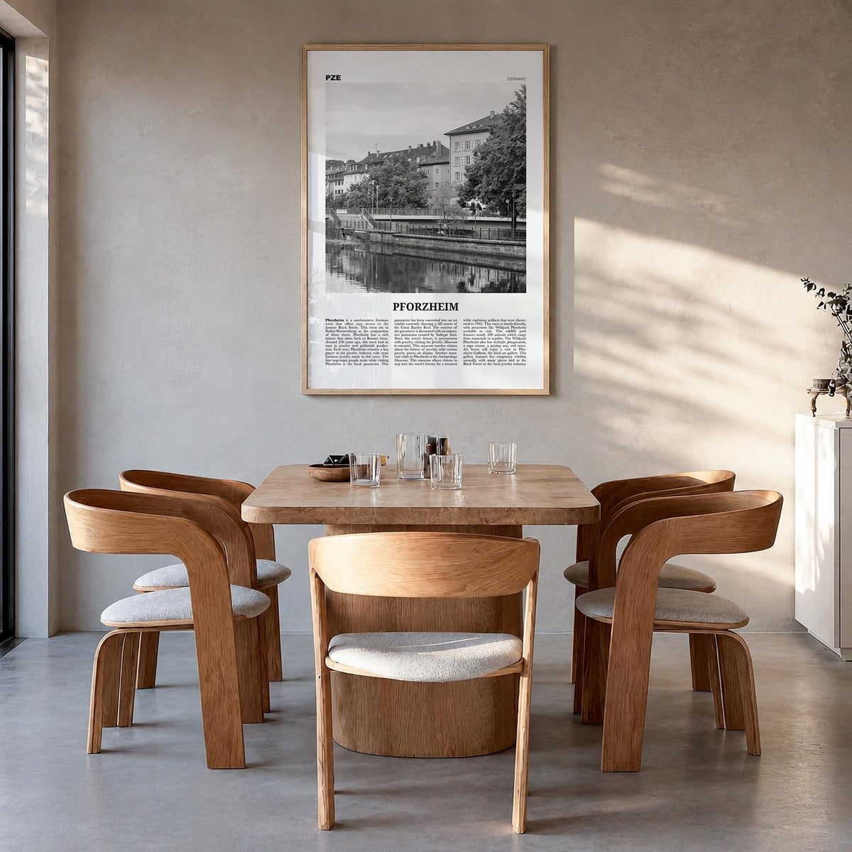 Pforzheim black & white newspaper poster of Germany – vertical wall art in natural wood frame, hanging on wall