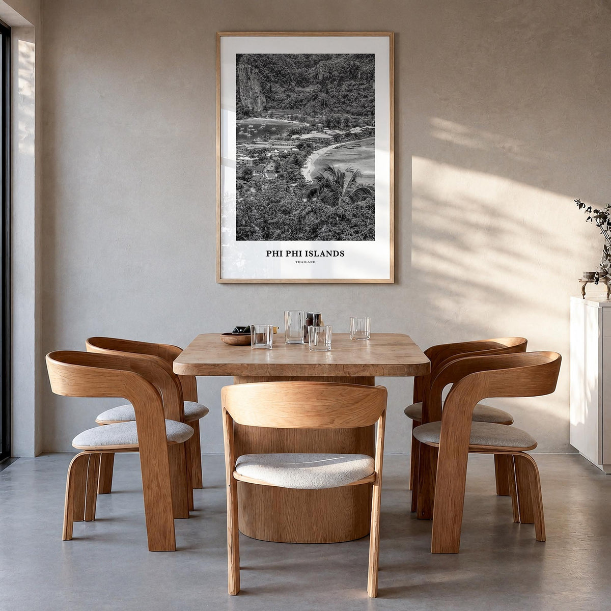 Phi Phi Islands black & white classic poster of Thailand – vertical wall art in natural wood frame, hanging on wall