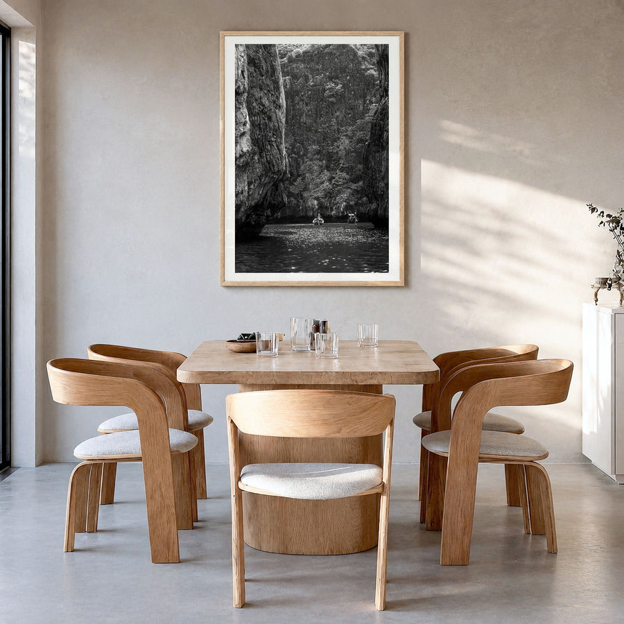 Phi Phi Islands Photo Poster in a natural wood frame, hanging in a dining room, white border