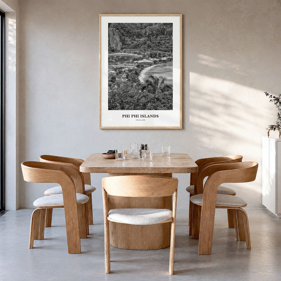 Phi Phi Islands Classic Poster in a natural wood frame, hanging in a dining room