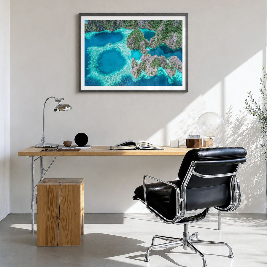 Philippines Photo Poster in a black wood frame, hanging in a bright home office, white border