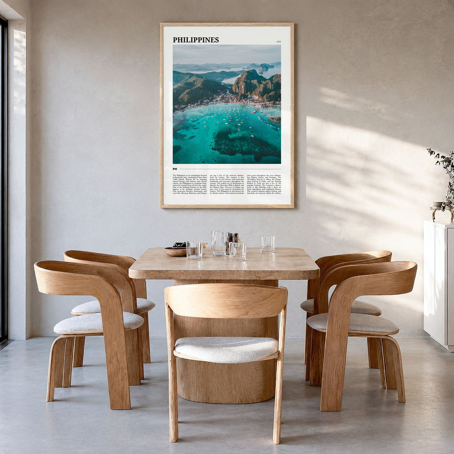 Philippines Travel No 1 Poster in a natural wood frame, hanging in a dining room