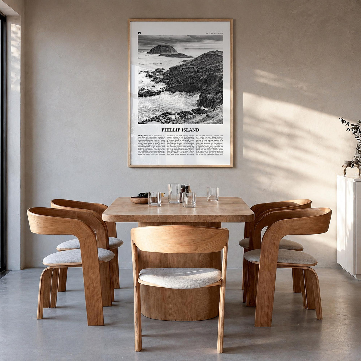 Phillip Island black & white newspaper poster of Australia – vertical wall art in natural wood frame, hanging on wall