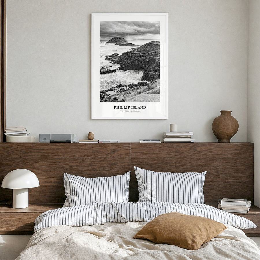 Phillip Island Classic Poster in a white wood frame, hanging in a bedroom