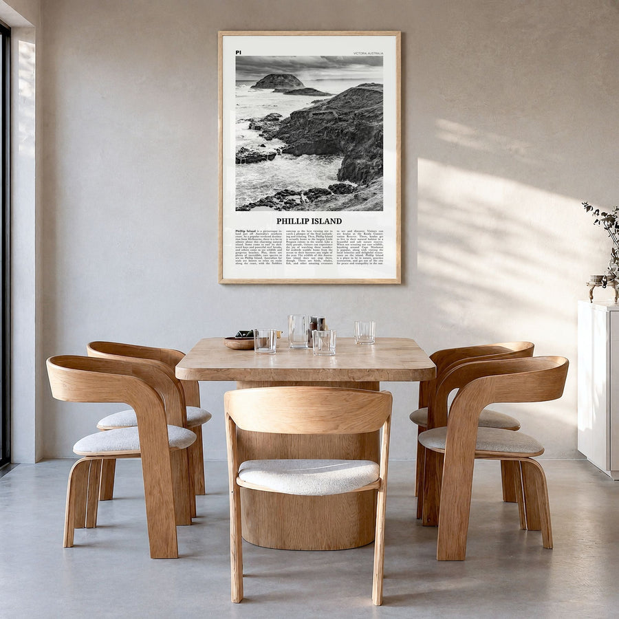 Phillip Island Newspaper Poster in a natural wood frame, hanging in a dining room