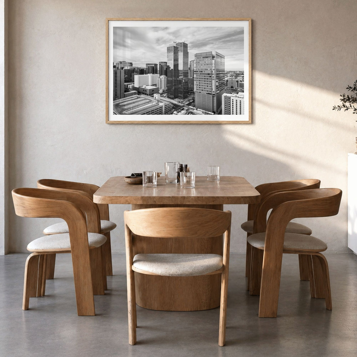 Phoenix Photo Poster in a natural wood frame, hanging in a dining room, white border