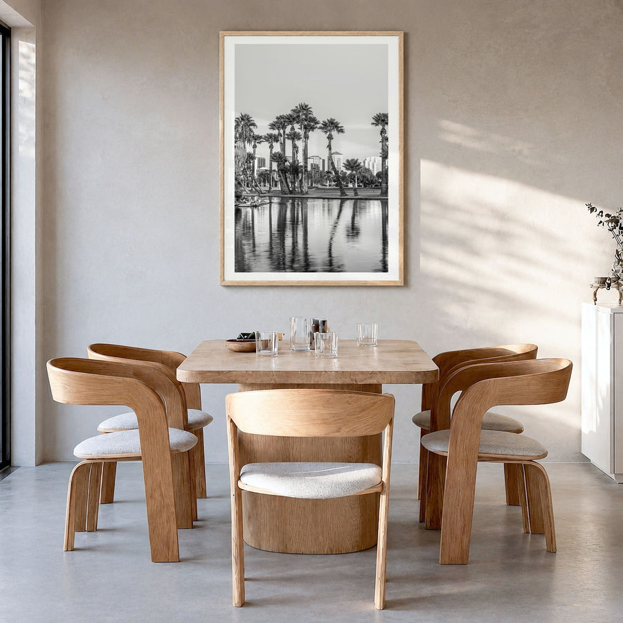 Phoenix Photo No 2 Poster in a natural wood frame, hanging in a dining room, white border
