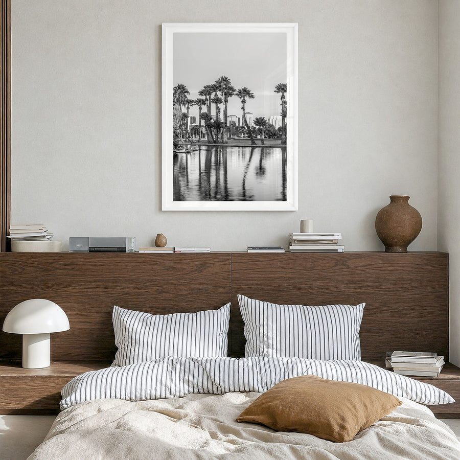 Phoenix Photo No 2 Poster in a white wood frame, hanging in a bedroom, white border