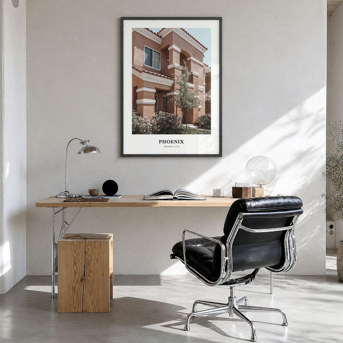 Phoenix Classic No 1 Poster in a black wood frame, hanging in a bright home office