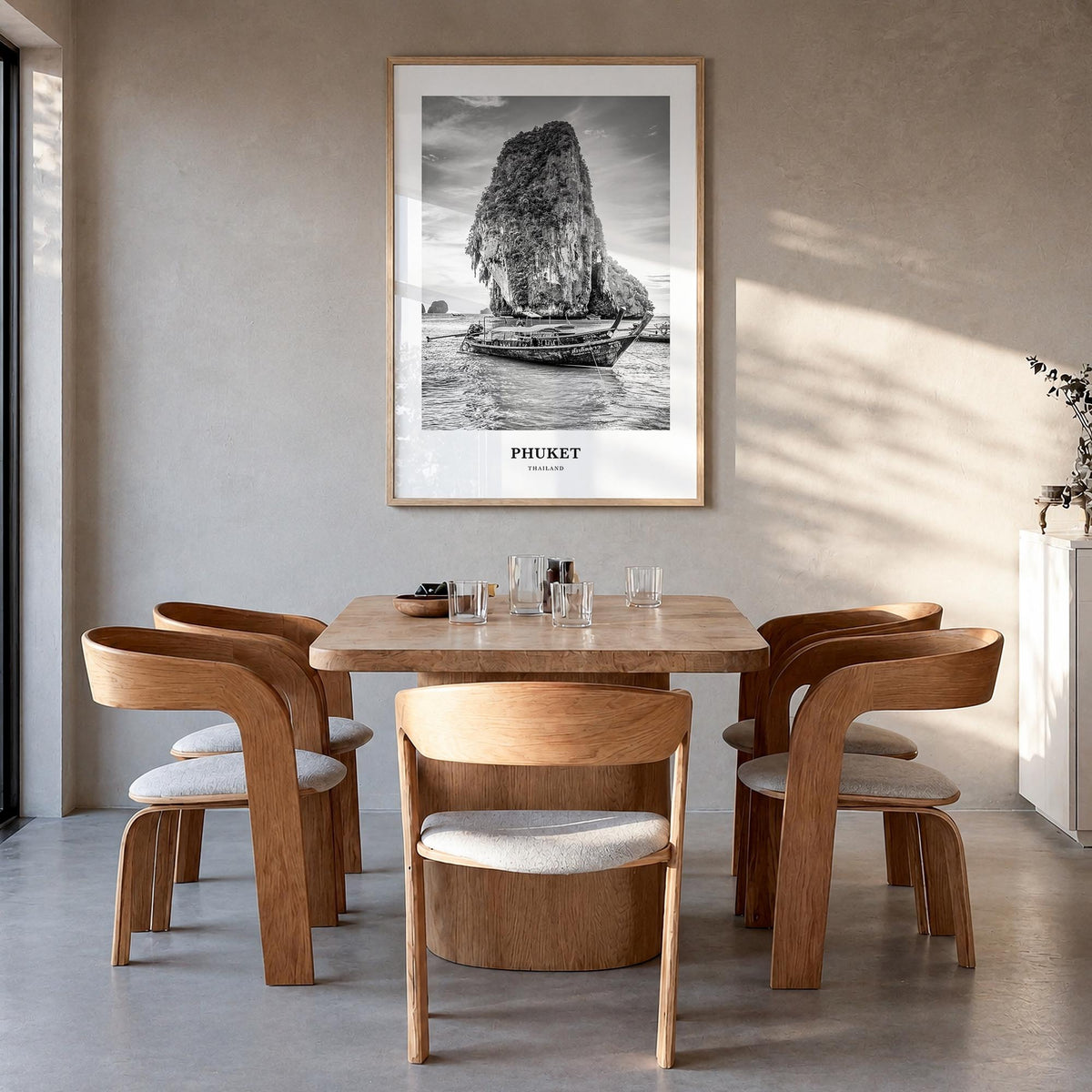 Phuket black & white classic poster of Thailand – vertical wall art in natural wood frame, hanging on wall