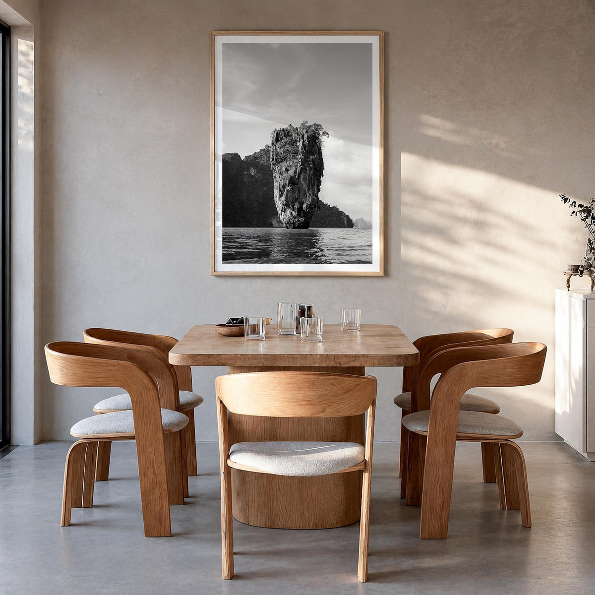 Phuket black & white photo poster of Thailand – vertical wall art in natural wood frame with white border, hanging on wall