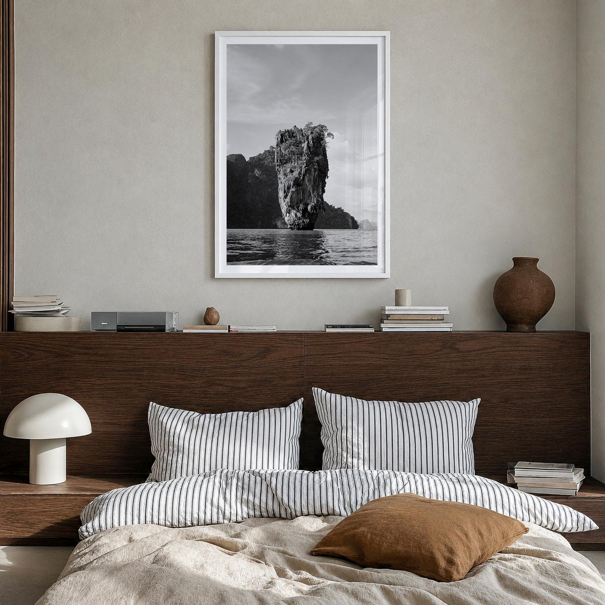 Phuket black & white photo poster of Thailand – vertical wall art in white wood frame with white border, hanging on wall