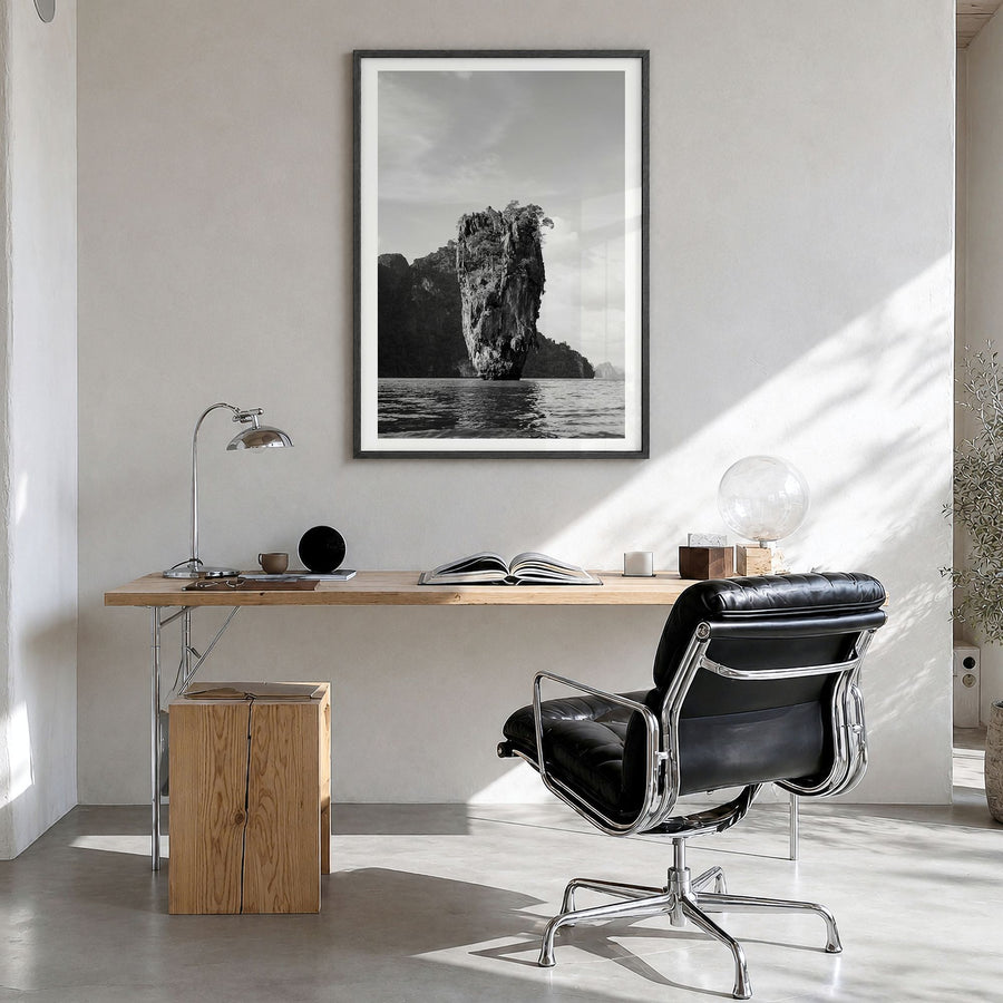 Phuket Photo Poster in a black wood frame, hanging in a bright home office, white border