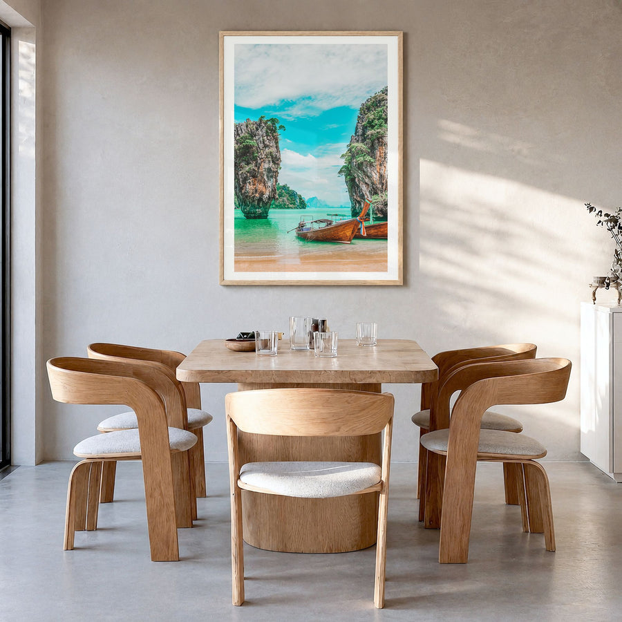 Phuket Photo Poster in a natural wood frame, hanging in a dining room, white border