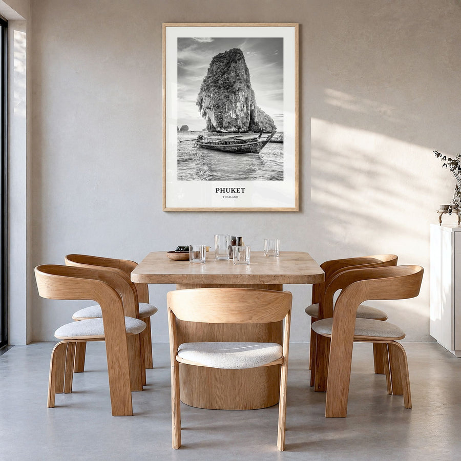 Phuket Classic Poster in a natural wood frame, hanging in a dining room