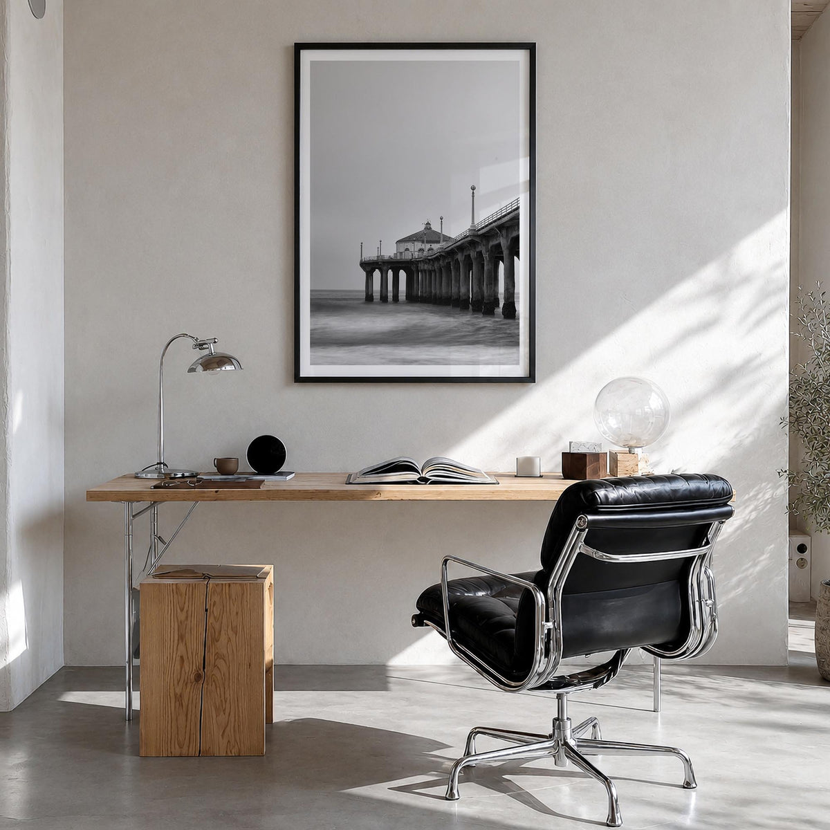 Pier no. 2 black & white photo poster – vertical wall art in black wood frame with white border, hanging on wall