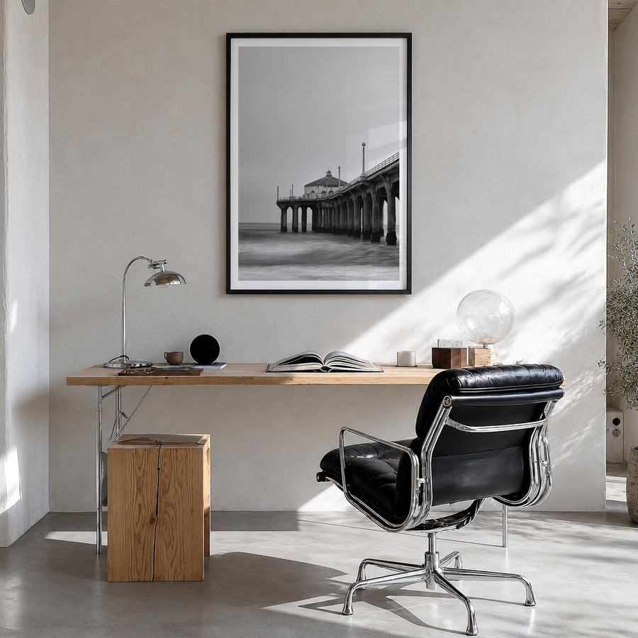 Pier no. 2 black & white photo poster – vertical wall art in black wood frame with white border, hanging on wall