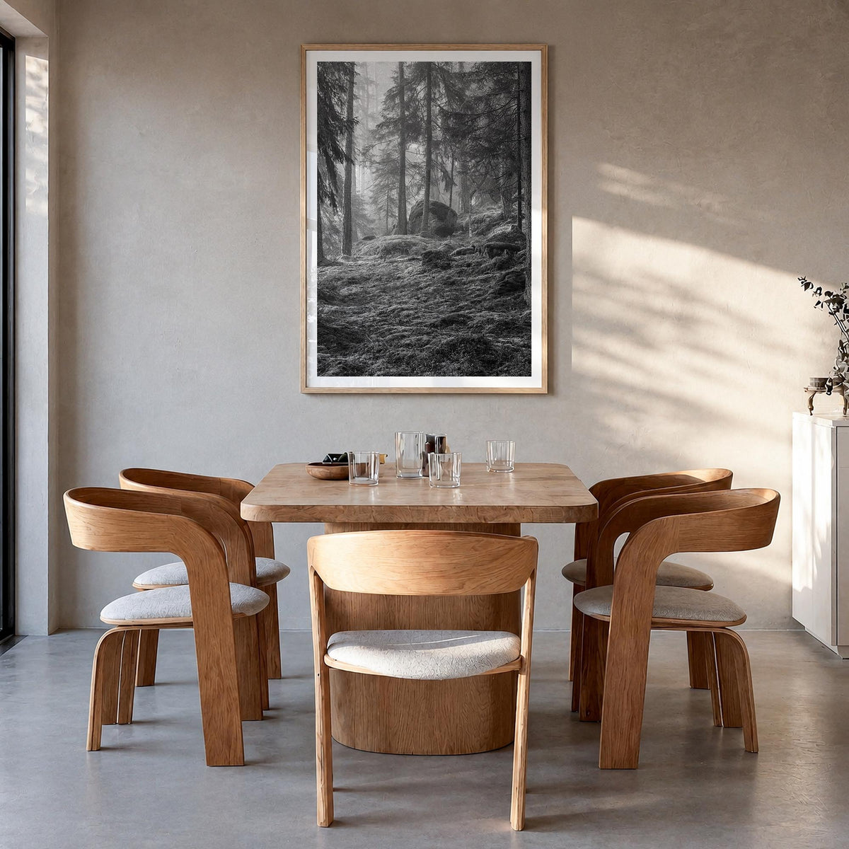 Pine Tree Forest no. 2 black & white photo poster – vertical wall art in natural wood frame with white border, hanging on wal