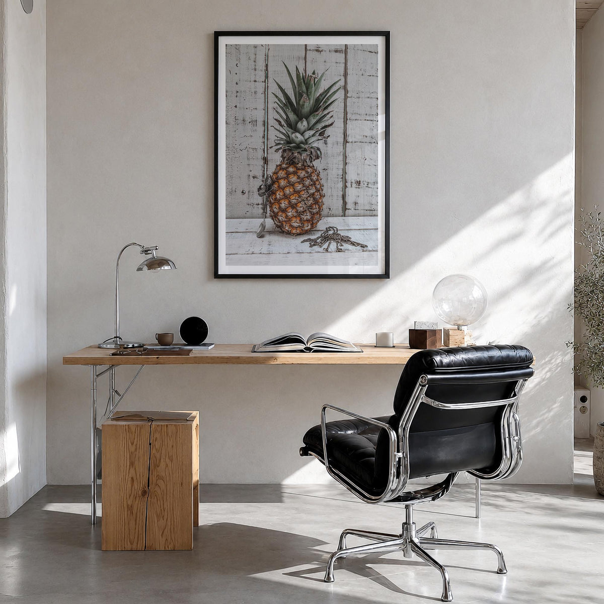 Pineapple no. 2 colorful photo poster – vertical wall art in black wood frame with white border, hanging on wall