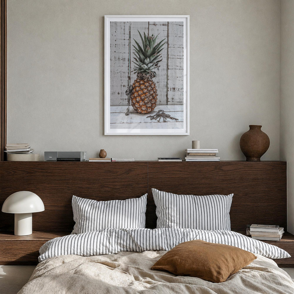 Pineapple no. 2 colorful photo poster – vertical wall art in white wood frame with white border, hanging on wall