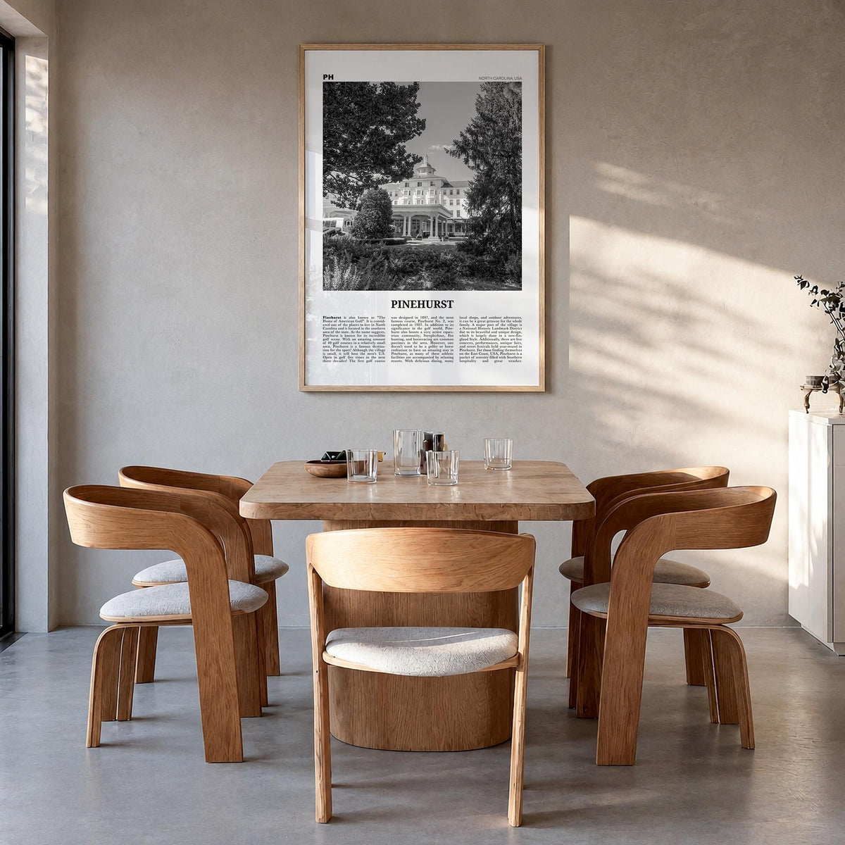 Pinehurst black & white newspaper poster of North Carolina, USA – vertical wall art in natural wood frame, hanging on wall