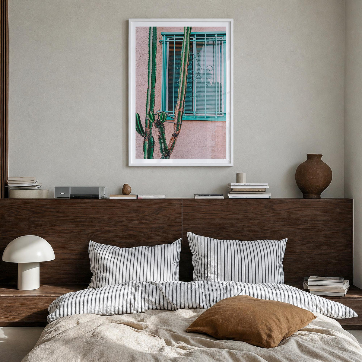 Pink Cactus colorful photo poster – vertical wall art in white wood frame with white border, hanging on wall