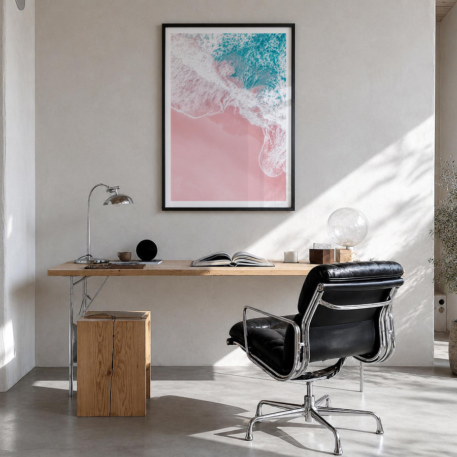 Pink Sandy Beach no. 2 colorful photo poster – vertical wall art in black wood frame with white border, hanging on wall